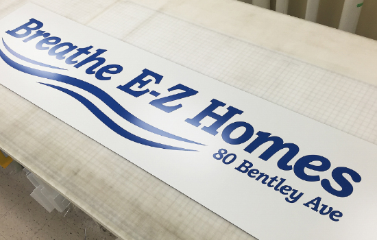 Aluminum panel (alupanel) signs with cut vinyl graphics